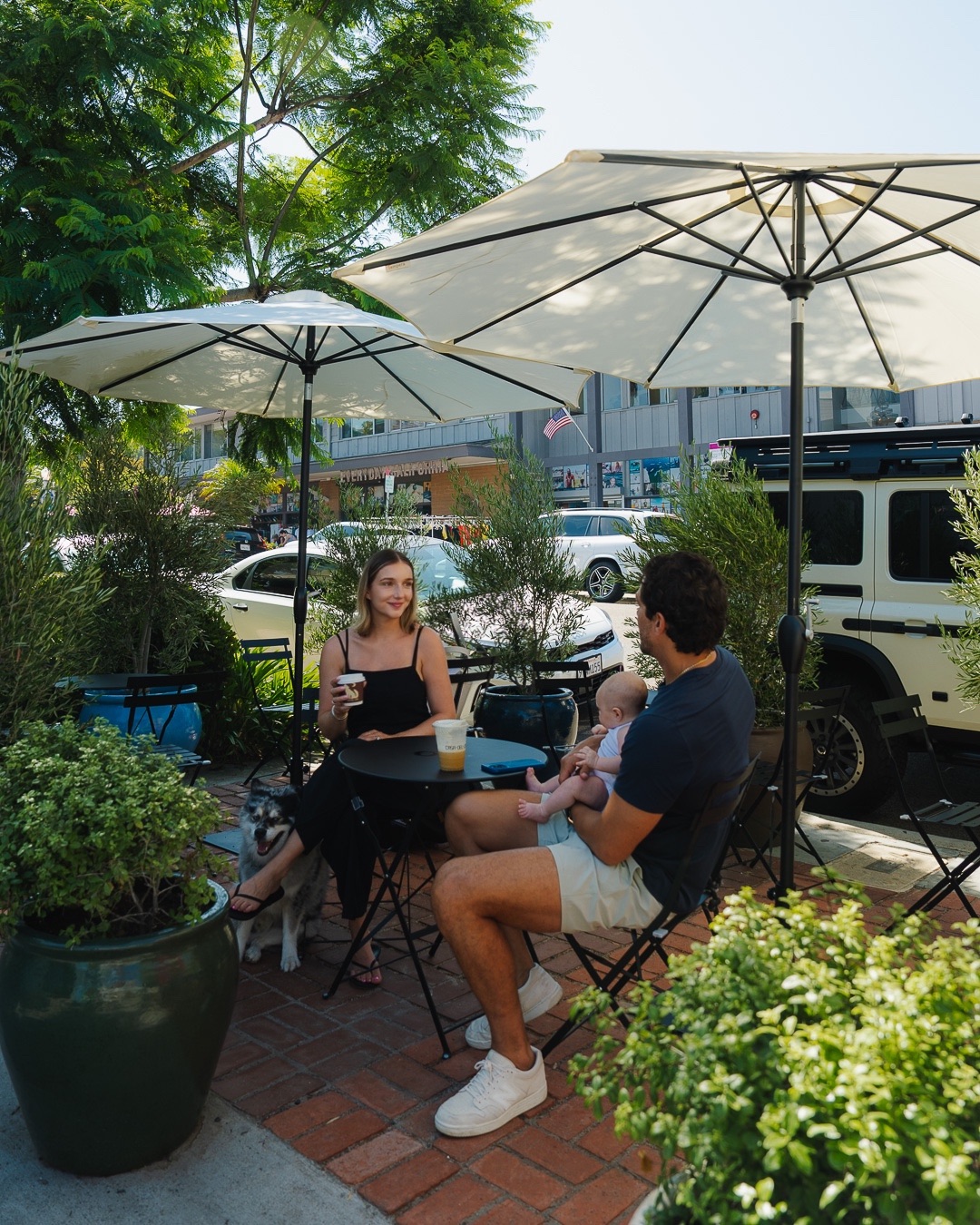 Guests enjoying coffee on the Casa Del Lobo patio